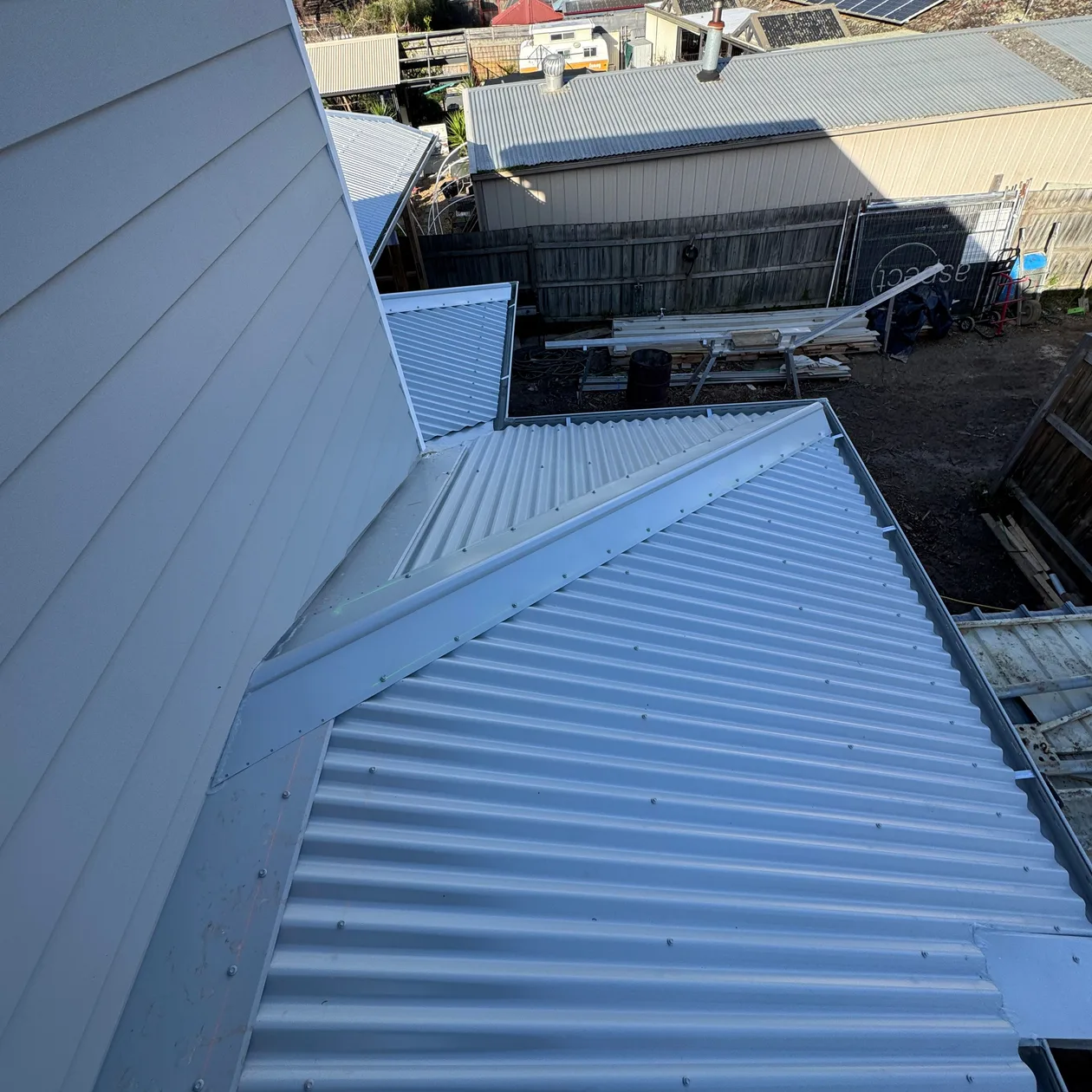 Metal flashing at a roof junction